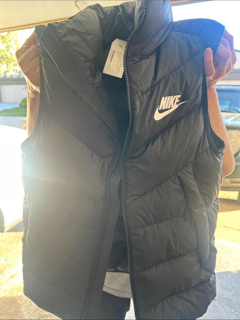 Nike Black Puffer Vest with White Swoosh